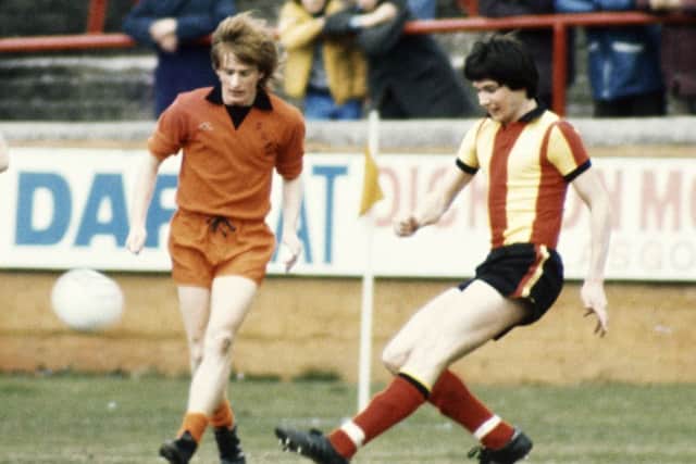 Graeme Payne, left, challenges for the ball with Partick Thistle's Alan Hansen in 1977. Picture: SNS