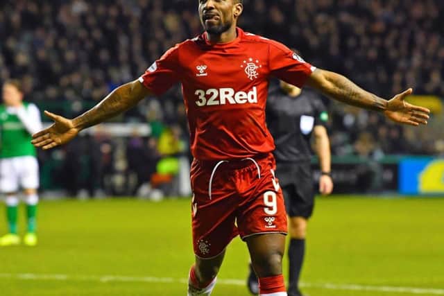 Jermaine Defoe celebrates scoring against Hibs.
