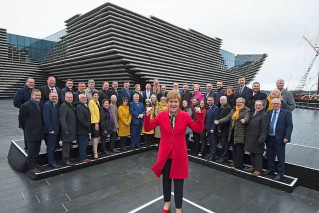 Nicola Sturgeon at a photocall with victorious MPs at Dundee's V&A. Picture: Neil Hanna