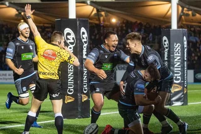 Ali Price celebrates his try at Scotstoun during an exciting end to the 1872 Cup win over Edinburgh. Picture: SRU/SNS