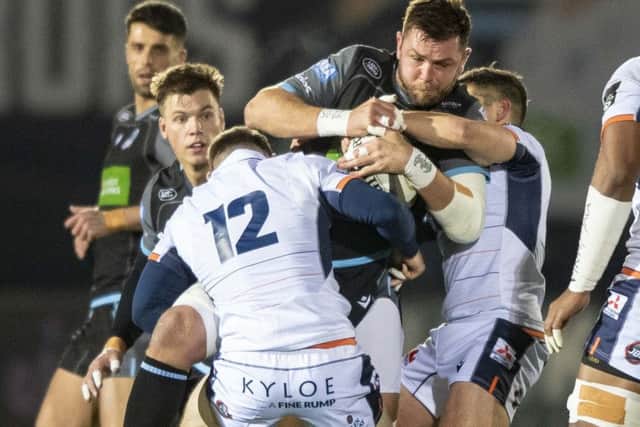 Ryan Wilson is tackled by George Taylor during the Guinness Pro14 match between Glasgow and Edinburgh at Scotstoun. Picture: Gary Hutchison/SNS/SRU