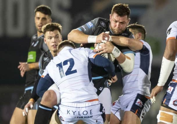 Ryan Wilson is tackled by George Taylor during the Guinness Pro14 match between Glasgow and Edinburgh at Scotstoun. Picture: Gary Hutchison/SNS/SRU