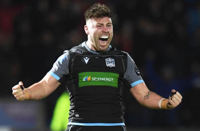 Ali Price, who scored a try for Glasgow moments after coming on, celebrates his side's win at full-time. Picture: Ross Parker/SNS