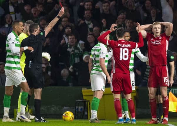 Aberdeen striker Sam Cosgrove, far right, can't believe Euan Anderson has shown him a red card during the Dons' 2-1 defeat by Celtic. Picture: Craig Williamson/SNS