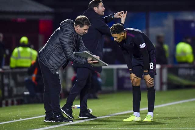 Hearts manager Daniel Stendel talks tactics with Sean Clare. Picture: Rob Casey/SNS