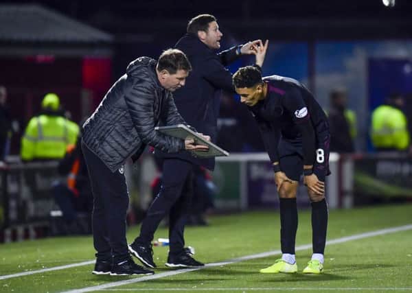 Hearts manager Daniel Stendel talks tactics with Sean Clare. Picture: Rob Casey/SNS