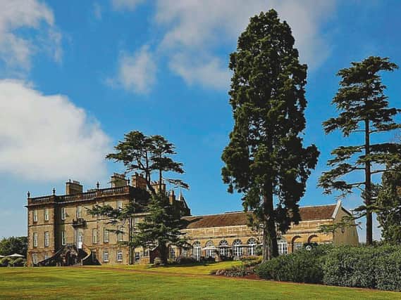 The grand country house exterior of DalmahoyHotel and Country Club, Kirknewton