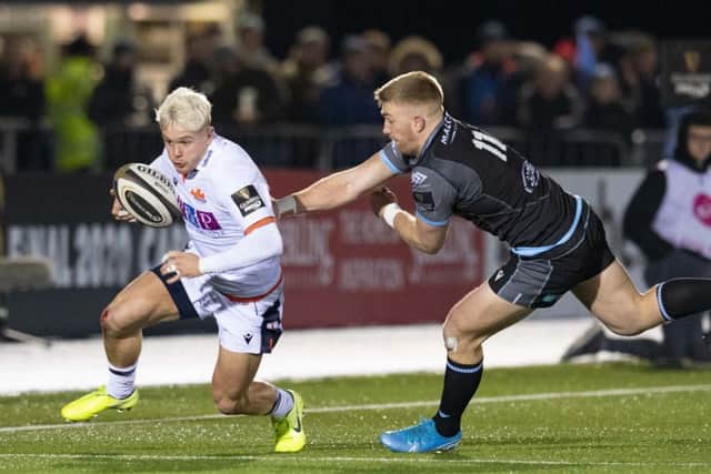 Edinburghs Darcy Graham (left) breaks past Glasgow Warriors Kyle Steyn during Saturdays 1972 Cup match at Scotstoun. Picture: SNS/SRU.