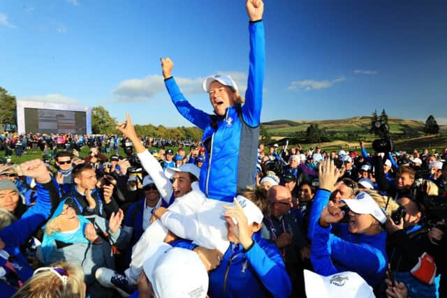 Europe captain Catriona Matthew is hoisted onto her players' shoulders to celebrate Solheim Cup victory at Gleneagles. Picture: David Cannon/Getty Images