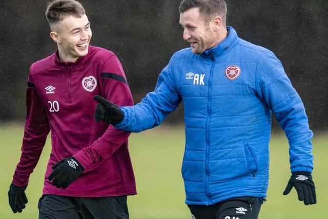 Andy Kirk with Harry Cochrane, left, during Hearts' training.