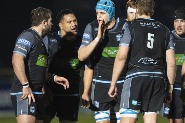 Glasgow Warriors' Scott Cummings, centre, talks to his forward colleagues. Picture: Gary Hutchison/SNS