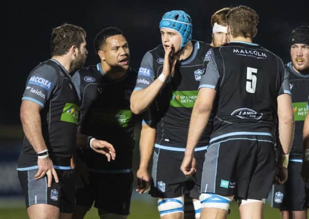 Glasgow Warriors' Scott Cummings, centre, talks to his forward colleagues. Picture: Gary Hutchison/SNS