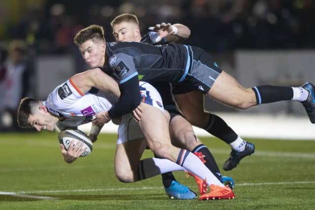 Glasgow's Huw Jones tackles Blair Kinghorn during the first 1872 Cup game at Scotstoun. Picture: Gary Hutchison/SNS