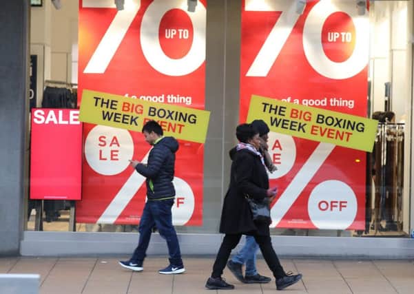 BIg discounts reflect the pressure on high street traders. Picture: Stewart Attwood
