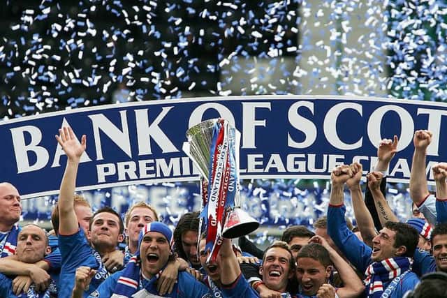 Captain Ricksen lifting the Premier League trophy high in 2005. Picture: Christopher Lee (Getty Images)