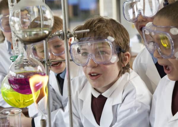 The number of staff qualified to conduct science classes, such as this one in chemistry, has dwindled. Picture: Getty