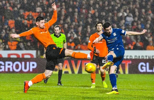 Graham Dorrans fires home Dundee's equalising goal five minutes into the second half. Picture: Rob Casey/SNS