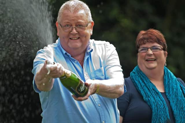 Colin Weir celebrates his lottery win. Picture: Getty Images