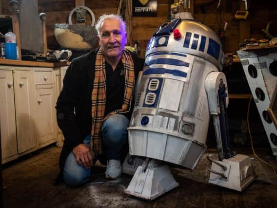 Ricky Butler, 66, built the life-size replica of the Star Wars droid R2-D2 in his shed. Picture: SWNS