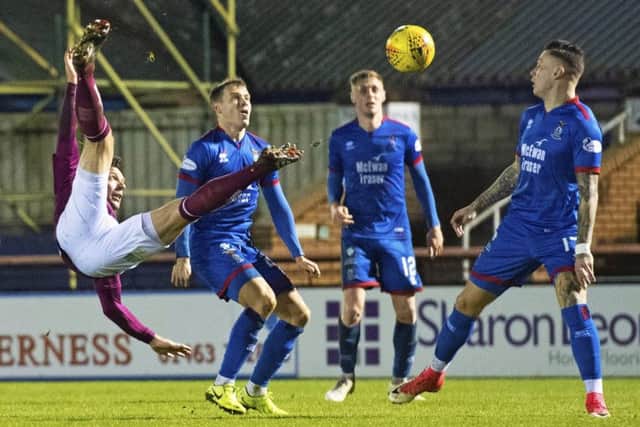 Ricky Little makes an acrobatic clearance during Arbroath's win over Inverness Caledonian Thistle. Picture: Alan Harvey / SNS