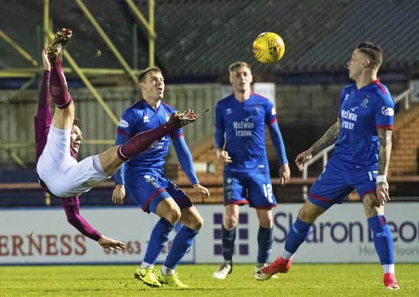 Ricky Little makes an acrobatic clearance during Arbroath's win over Inverness Caledonian Thistle. Picture: Alan Harvey / SNS