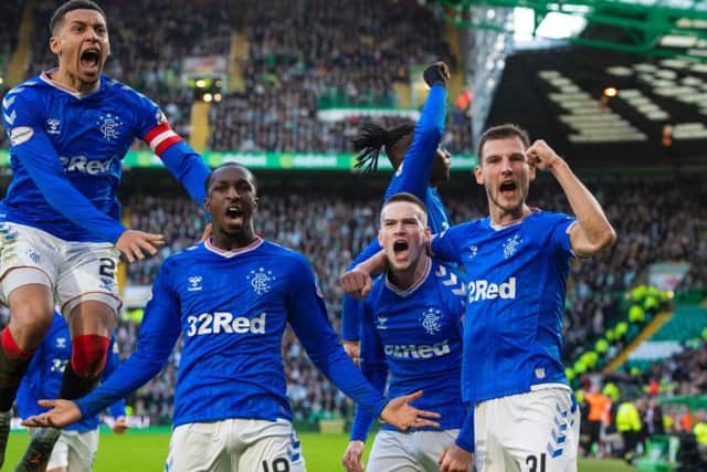Borna Barisic celebrates Ryan Kent's opener at Celtic Park