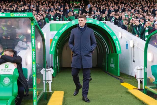 Steven Gerrard walks out at Celtic Park - the Rangers boss insists the Hoops are still favourites for the title