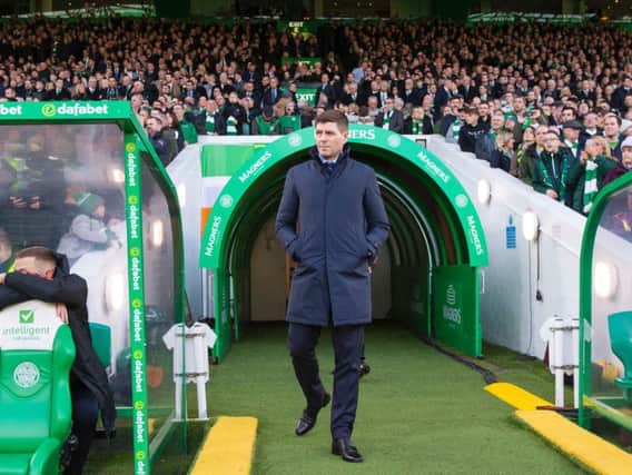 Steven Gerrard walks out at Celtic Park - the Rangers boss insists the Hoops are still favourites for the title