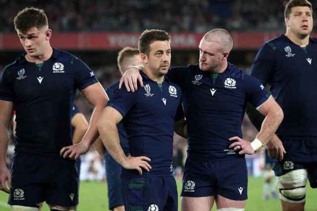 Scotland's Greig Laidlaw and Stuart Hogg look dejected after defeat to Japan during the 2019 Rugby World Cup. Picture: David Davies/PA Wire