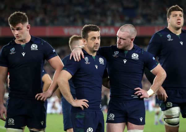 Scotland's Greig Laidlaw and Stuart Hogg look dejected after defeat to Japan during the 2019 Rugby World Cup. Picture: David Davies/PA Wire