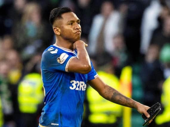Alfredo Morelos gestures as he comes off the pitch at Celtic Park on Sunday. Picture: SNS