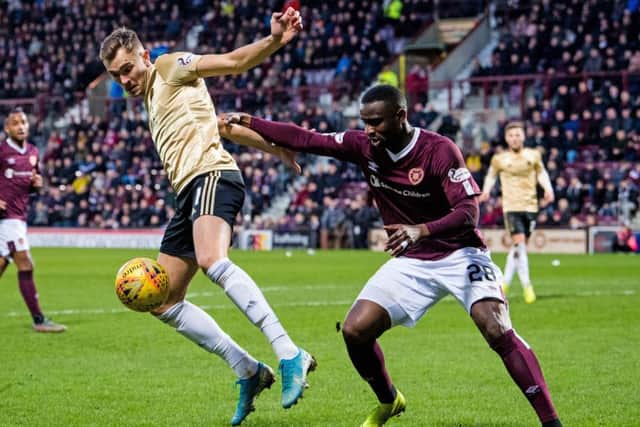 Clevid Dikamona replaced Hearts captain Christophe Berra in the centre of defence against Aberdeen. Picture: Ross Parker/SNS Group