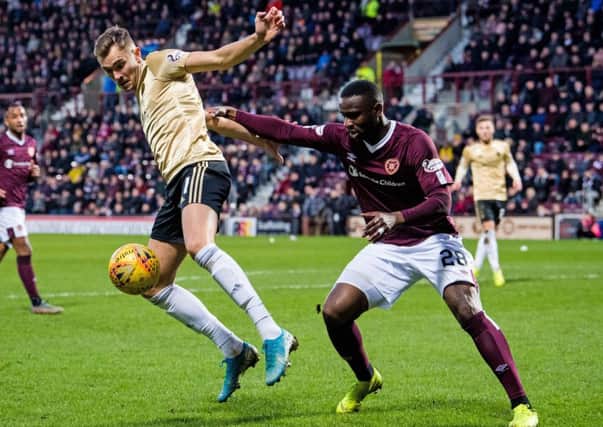 Clevid Dikamona replaced Hearts captain Christophe Berra in the centre of defence against Aberdeen. Picture: Ross Parker/SNS Group