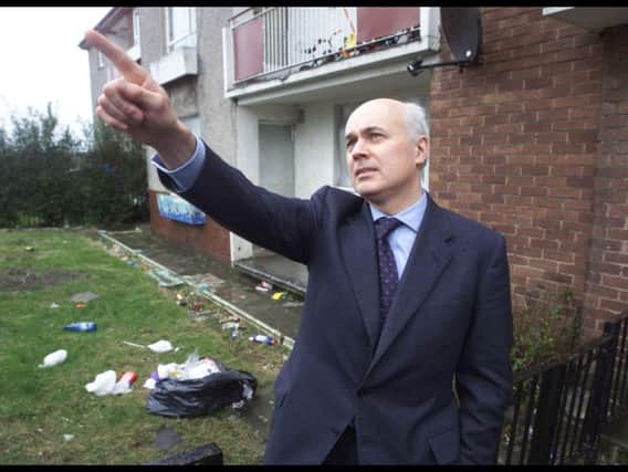 Iain Duncan Smith visiting Easterhouse in Glasgow in 2002.
