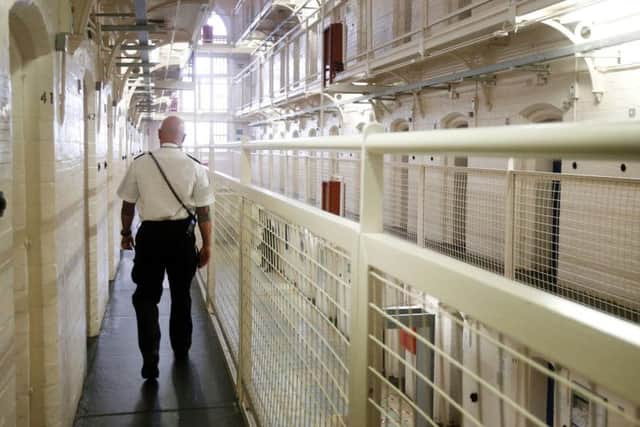 Election hustings could be held in prisons under plans being discussed to give some prisoners the vote.