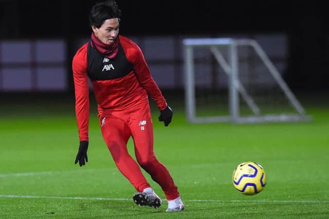 akumi Minamino trains with his new Liverpool team-mates for the first time at Melwood on Tuesday. Picture: Getty.