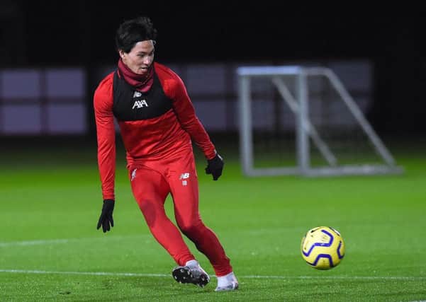 akumi Minamino trains with his new Liverpool team-mates for the first time at Melwood on Tuesday. Picture: Getty.