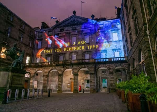 Kayus Bankole's words projected onto Edinburgh City Chambers as part of Message From the Skies PIC: Rianne White