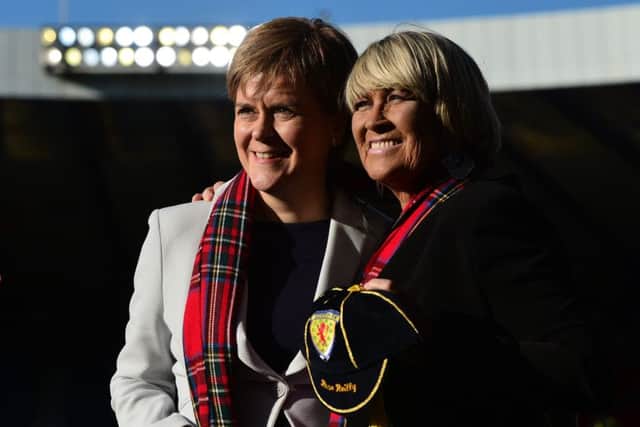 Rose Reilly receives her Scotland cap from First Minister Nicola Sturgeon. Picture: Mark Runnacles/Getty Images