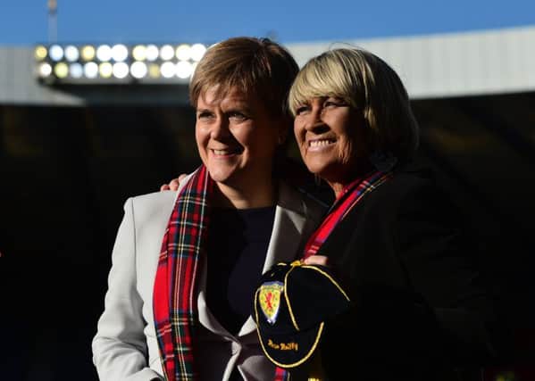 Rose Reilly receives her Scotland cap from First Minister Nicola Sturgeon. Picture: Mark Runnacles/Getty Images