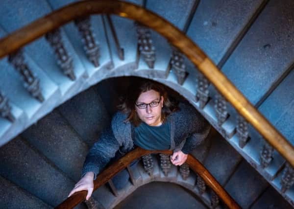David Cole in the stairwell of his Edinburgh tenement. Picture: Ian Georgeson