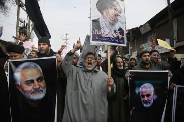 Kashmiri Shiite Muslims shout anti American and anti Israel slogans during a protest against U.S. airstrike in Iraq that killed Iranian Revolutionary Guard General Qassem Soleimani. Picture: AP/Mukhtar Khan