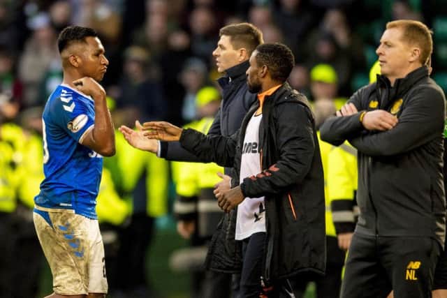 Alfredo Morelos gestures to fans as he is sent off during the latest Old Firm clash with Celtic. Photograph: Craig Williamson/SNS