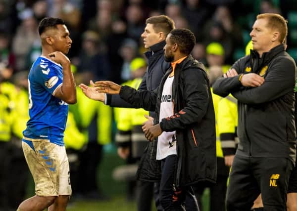 Alfredo Morelos gestures to fans as he is sent off during the latest Old Firm clash with Celtic.  Photograph: Craig Williamson/SNS