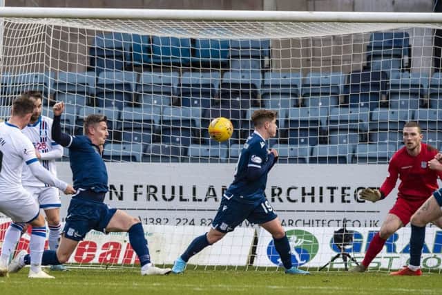 Aaron Doran fires through a crowd of bodies for 1-0. Photograph: Gary Hutchison/SNS