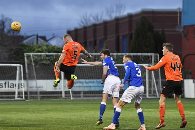Mark Connolly scored the games only goal with a thumping header. Picture: SNS.
