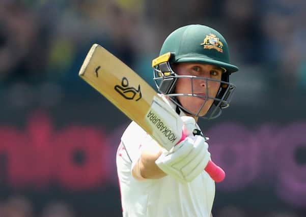 Australia's Marnus Labuschagne acknowledges the crowd after reaching 150 runs during the second day of the third Test match against New Zealand. Photo: by Jeremy Ng/AFP via Getty.