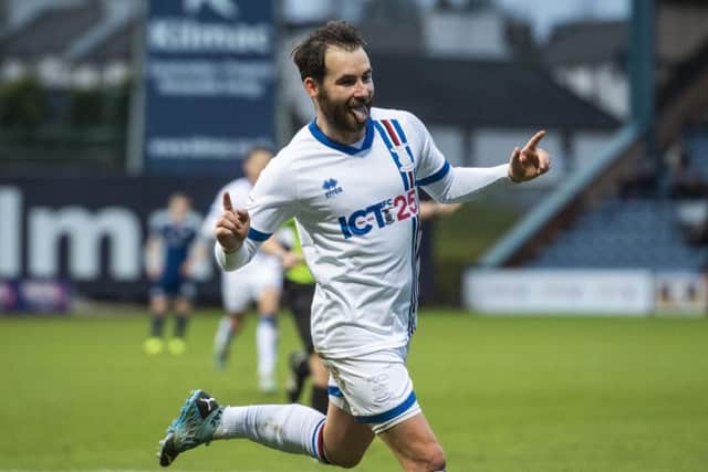 James Keatings celebrates after scoring the goal that put Inverness Caley Thistle 2-0 ahead at Dens Park. Picture: SNS.