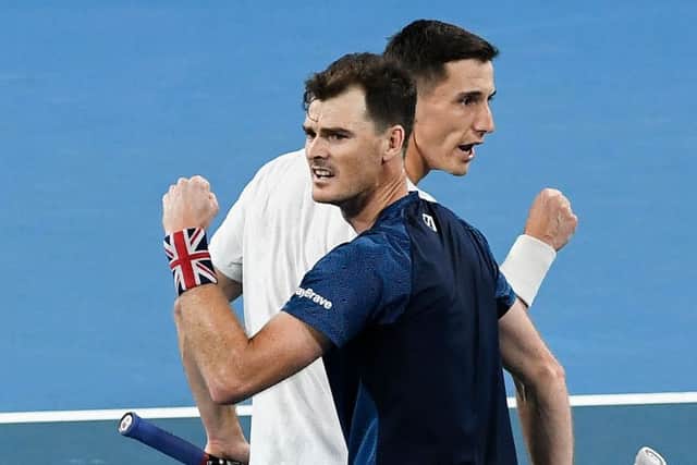 Britain's Jamie Murray, left, and Joe Salisbury celebrate winning a point in their doubles victory over Sander Gille and Joran Vliegen of Belgium. Picture: William West/AFP via Getty Images