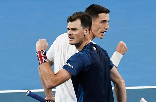Britain's Jamie Murray, left, and Joe Salisbury celebrate winning a point in their doubles victory over Sander Gille and Joran Vliegen of Belgium. Picture: William West/AFP via Getty Images